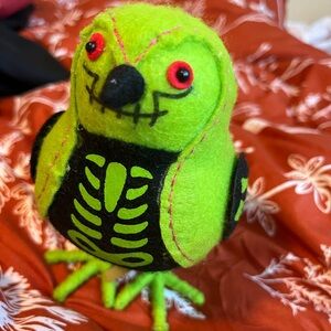 Green and Black Plush Bird Toy